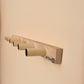 Versatile Wooden Peg Rail for Display & Storage