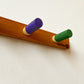 Versatile Wooden Peg Rail for Display & Storage